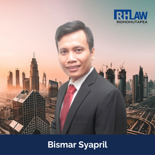 Portrait photo of Bismar Syapril in business suit